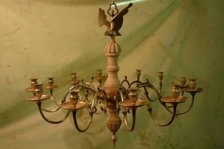 18th Century brass chandelier we restored this piece with pearwood turnings and carvings, this was then gilded, the wooden repairs can be used in the future to be made into moulds which can be cast in brass